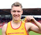 Scott Hall (Northumberland) with his bronze medal in the senior boys triple jump.